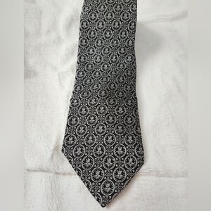 Vintage 1970's Beau Brummell Tie. Black And Silver Medallion Pattern